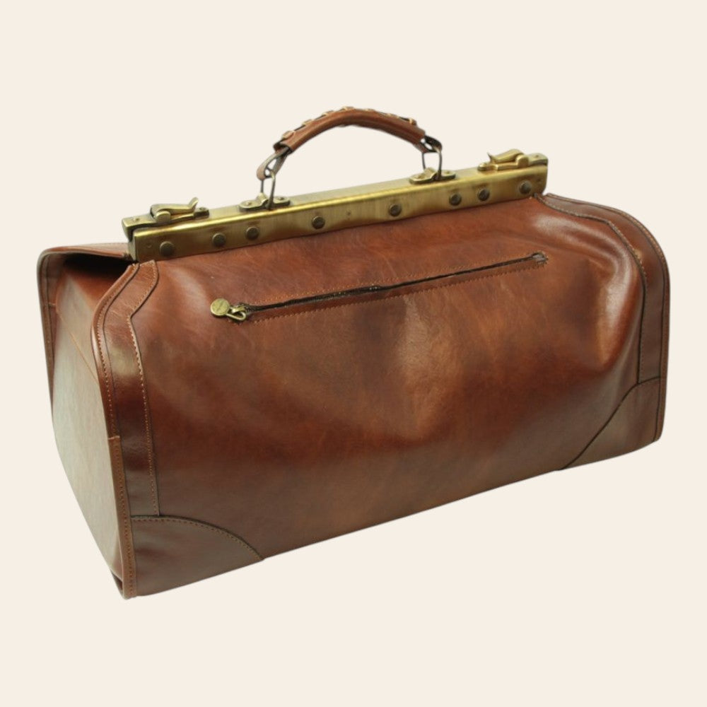 Borsa da viaggio media in pelle marrone con manici e fibbie in ottone