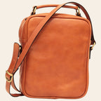 Borsa a tracolla in pelle marrone, chiusura con zip, tracolla in cuoio e maniglie superiori