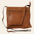 Borsa a tracolla in pelle marrone con tasca frontale con zip e tracolla lunga