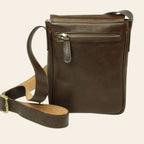 Borsa a tracolla in pelle marrone scuro con zip frontale e tracolla con fibbia