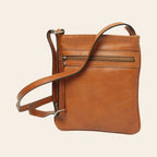 Borsa a tracolla piccola in pelle color cuoio con doppia tasca frontale e tracolla regolabile