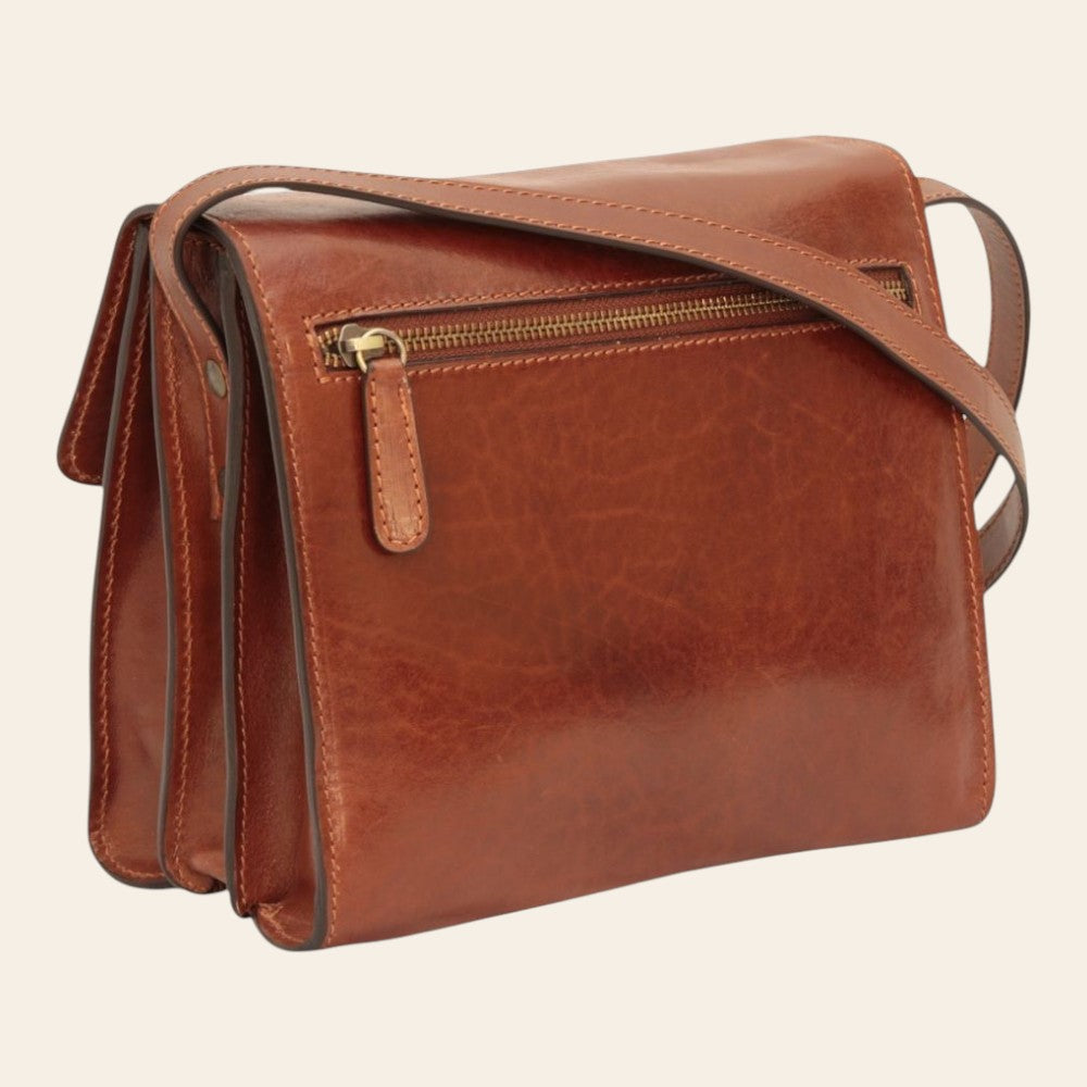 Borsa a tracolla in vitello pieno fiore marrone con zip frontale e tracolla.