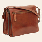 Borsa a tracolla in vitello pieno fiore marrone con zip frontale e tracolla.