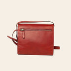 Borsa a tracolla rossa in vitello con zip centrale e tracolla