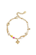 Bracciale quadrifoglio con perline, stile casual, in acciaio inossidabile con ciondolo e perle.
