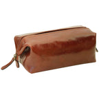 Astuccio per cosmetici in pelle marrone con zip frontale e occhiello laterale