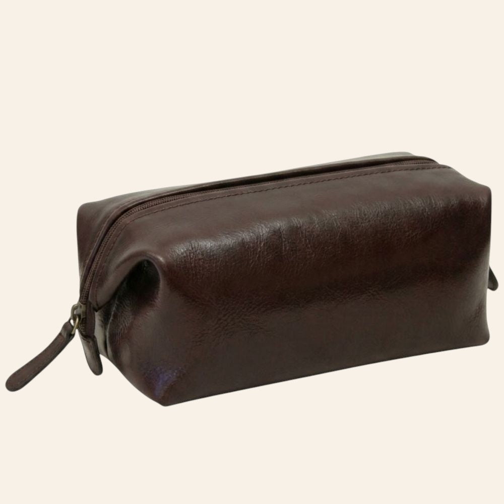 Astuccio per cosmetici in pelle marrone scuro, profilo arrotondato e zip