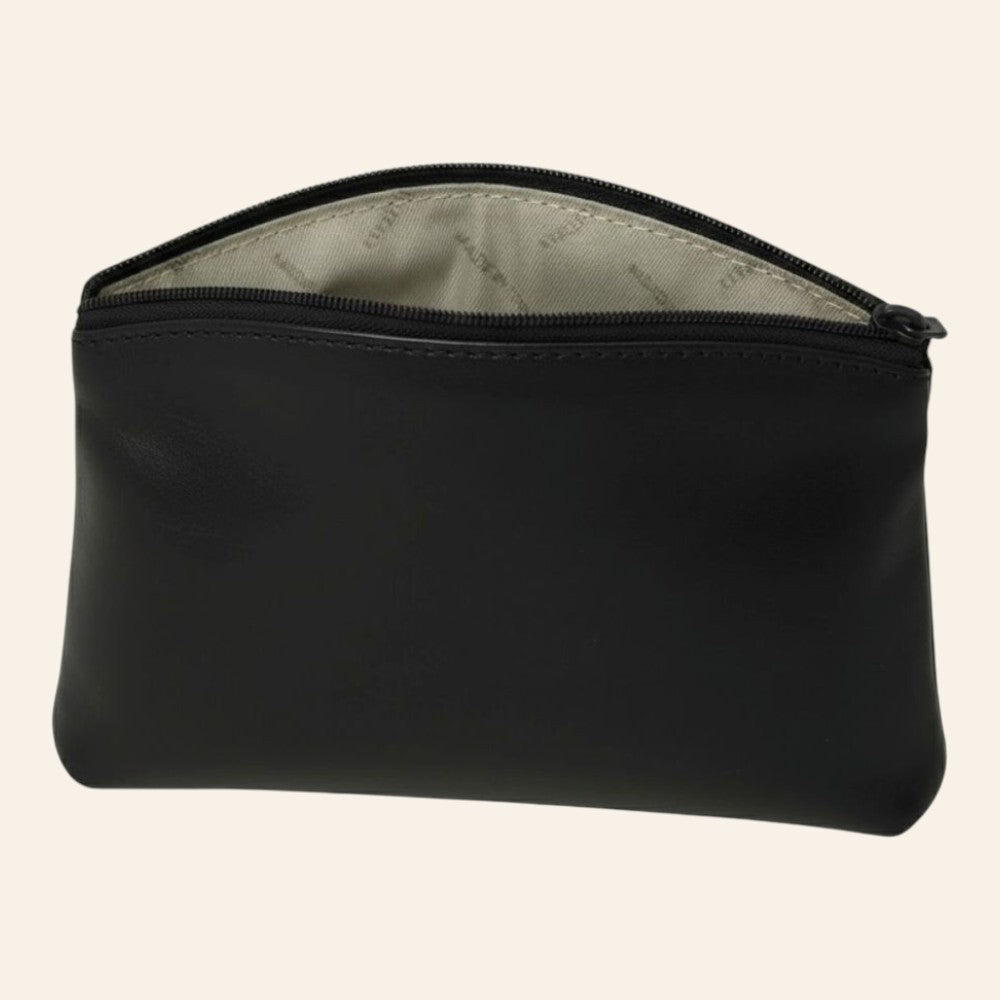 Beauty case in pelle nera con zip superiore e interno foderato visibile