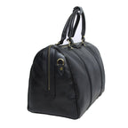 Bauletto da viaggio in pelle scura con zip frontale e fibbie dorate