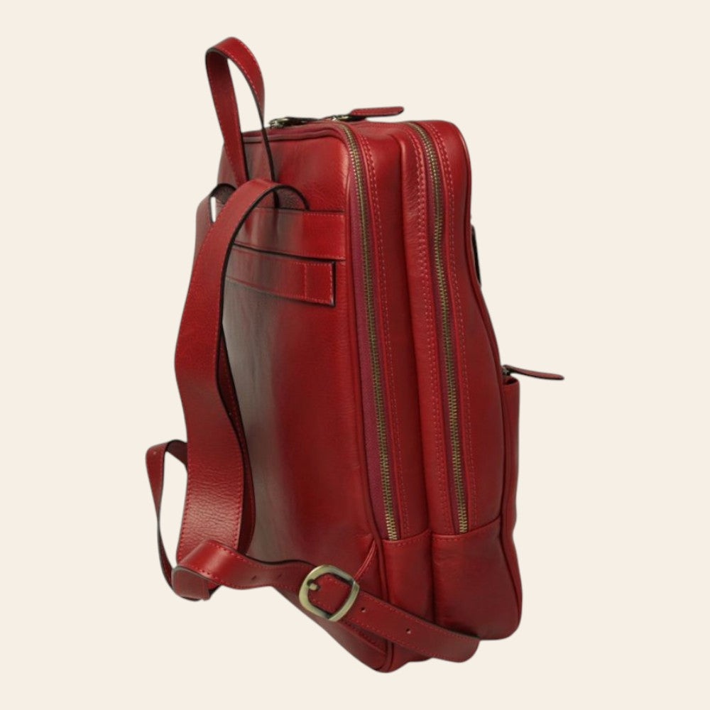 Zaino in pelle rosso con due tasche laterali con cerniera e tracolla