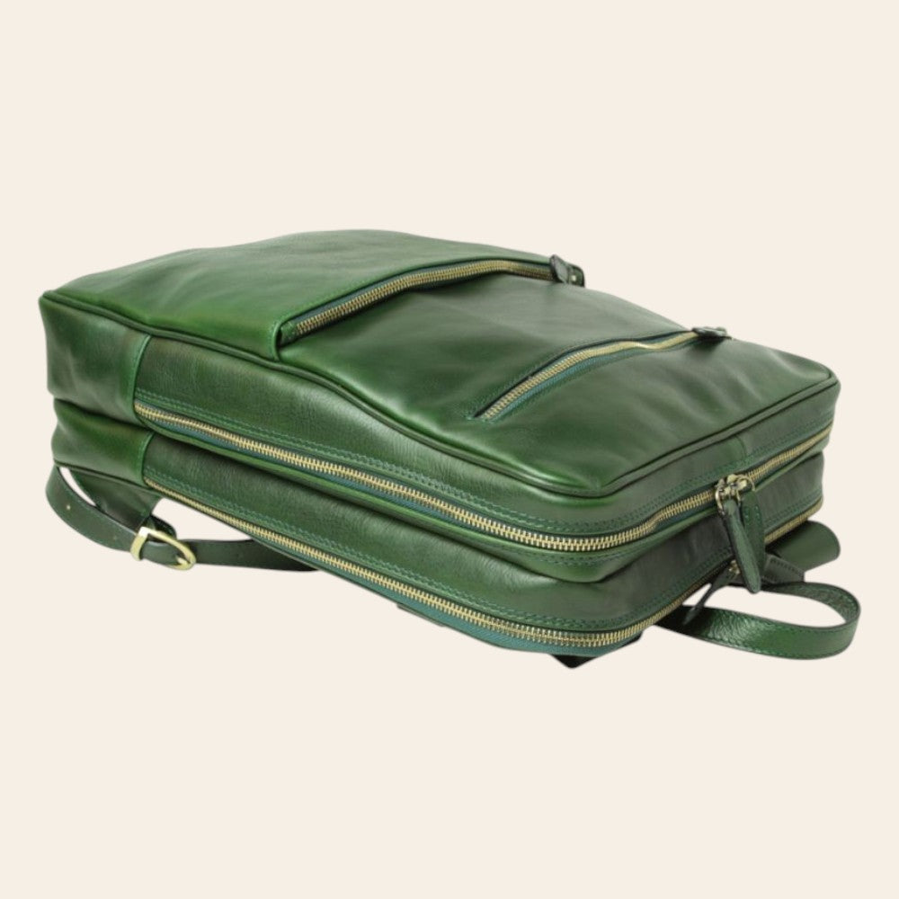 Zaino in pelle verde con tasca superiore e zip lungo il bordo