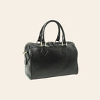 Bauletto in pelle nera con manici doppi e tasche laterali, forma arrotondata