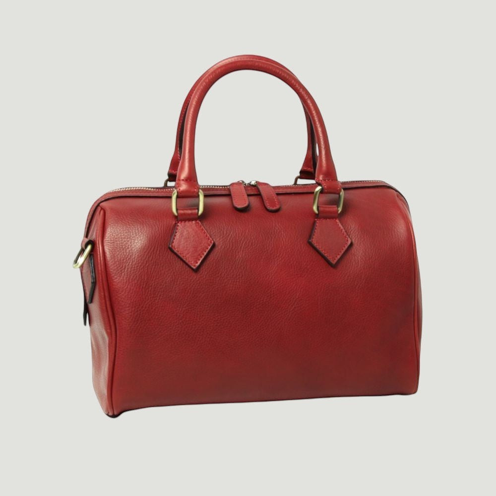Bauletto in pelle rossa con due manici e tracolla, tasche frontali con fibbie