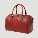 Bauletto in pelle rossa con due manici e zip laterale, accessori color oro