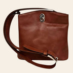 Borsa secchiello in pelle marrone, tracolla in cuoio con fibbia