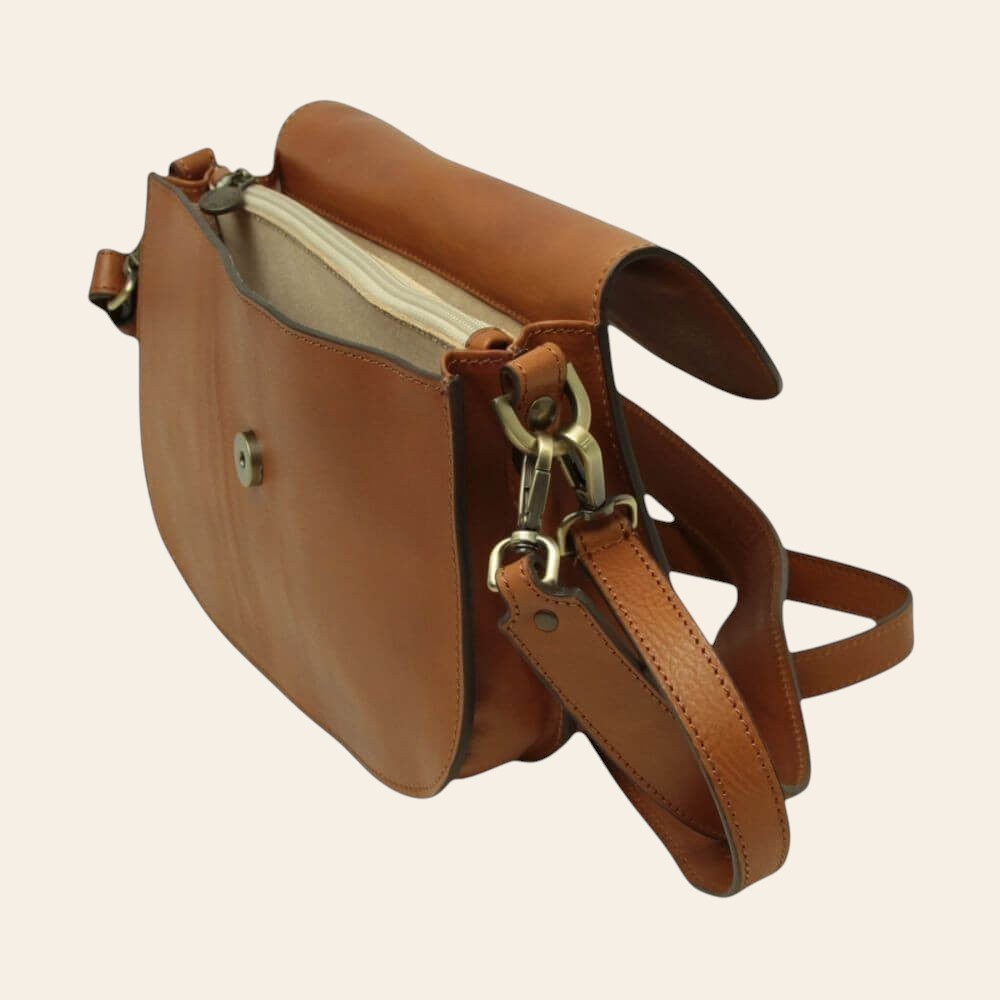 Borsa a tracolla marrone vista laterale con anello porta-tracolla e interno chiaro