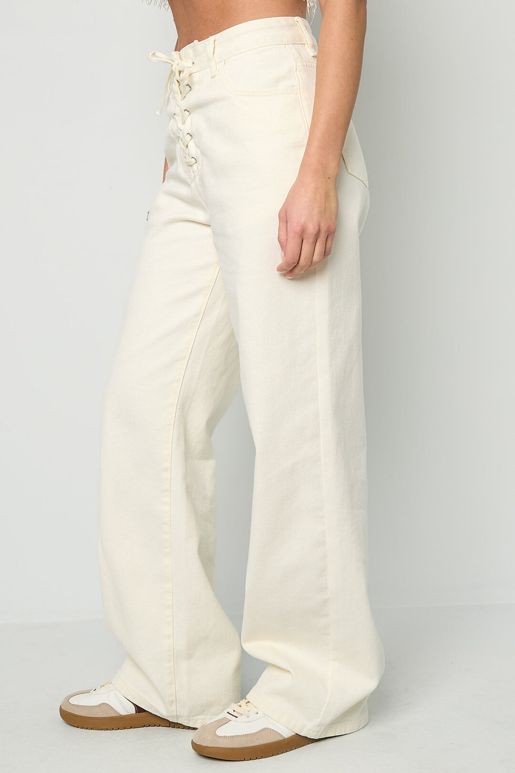 Jeans in denim con lacci
