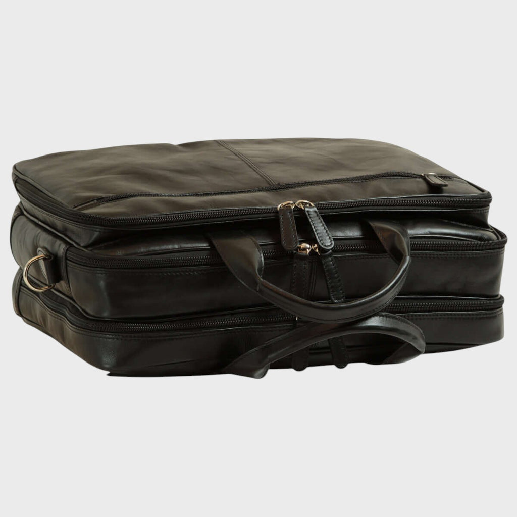 Borsa da laptop in pelle nera con maniglie e tracolla, lato con zip e angoli rinforzati