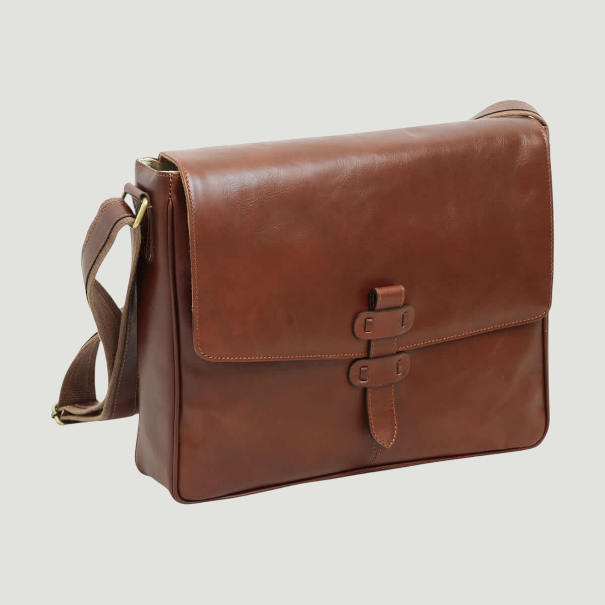 Borsa messenger in pelle marrone con chiusura a fibbia doppia e tracolla