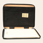 Porta documenti in pelle nero aperto con fodera beige e superficie bianca estraibile