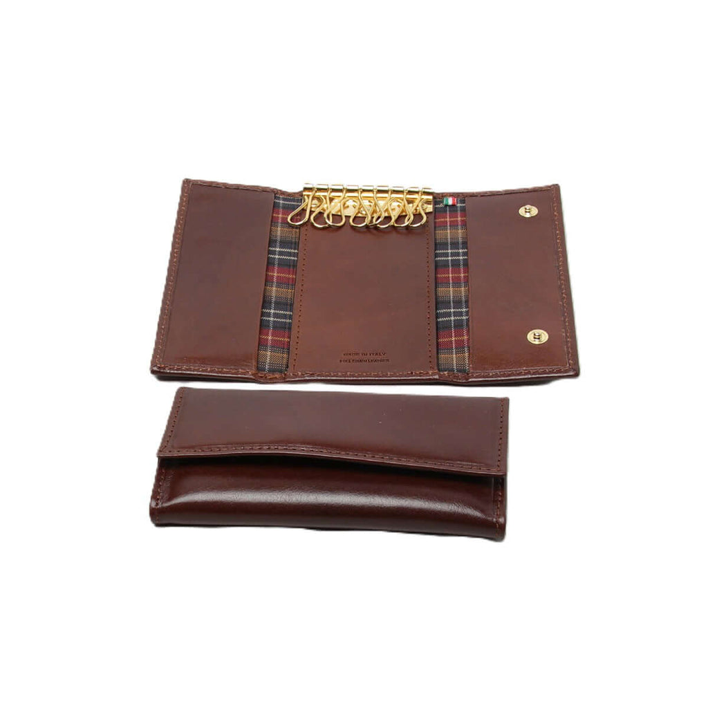 Portachiavi pelle 8 ganci marrone con foderato in poliestere e tasche portacarte, chiusura a pressione.