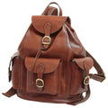 Zaino pelle marrone tre tasche con fibbie, fodera in tessuto e chiusura con calamita.