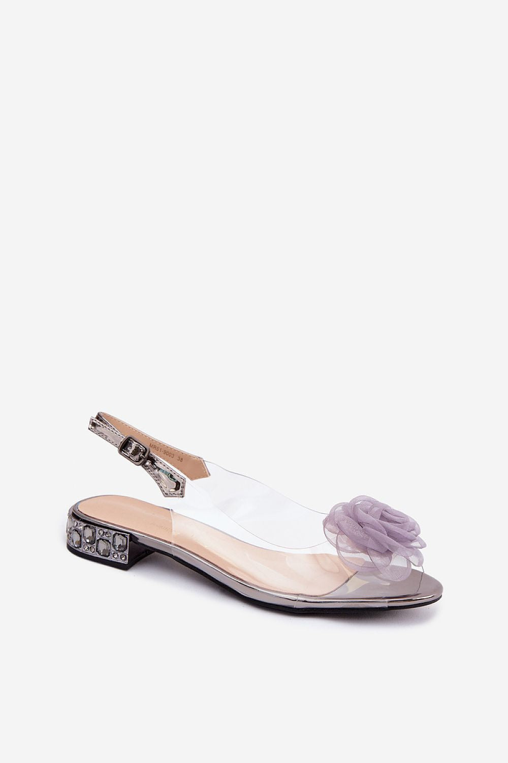 Sandalie flat in ecopelle trasparente con fiore lilla e dettagli scuri