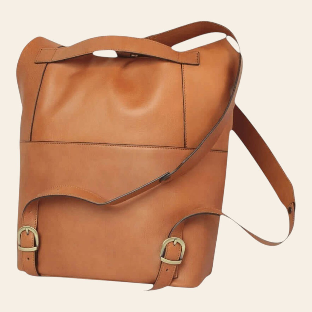 Zaino in pelle marrone con manico superiore e tasche laterali con fibbie