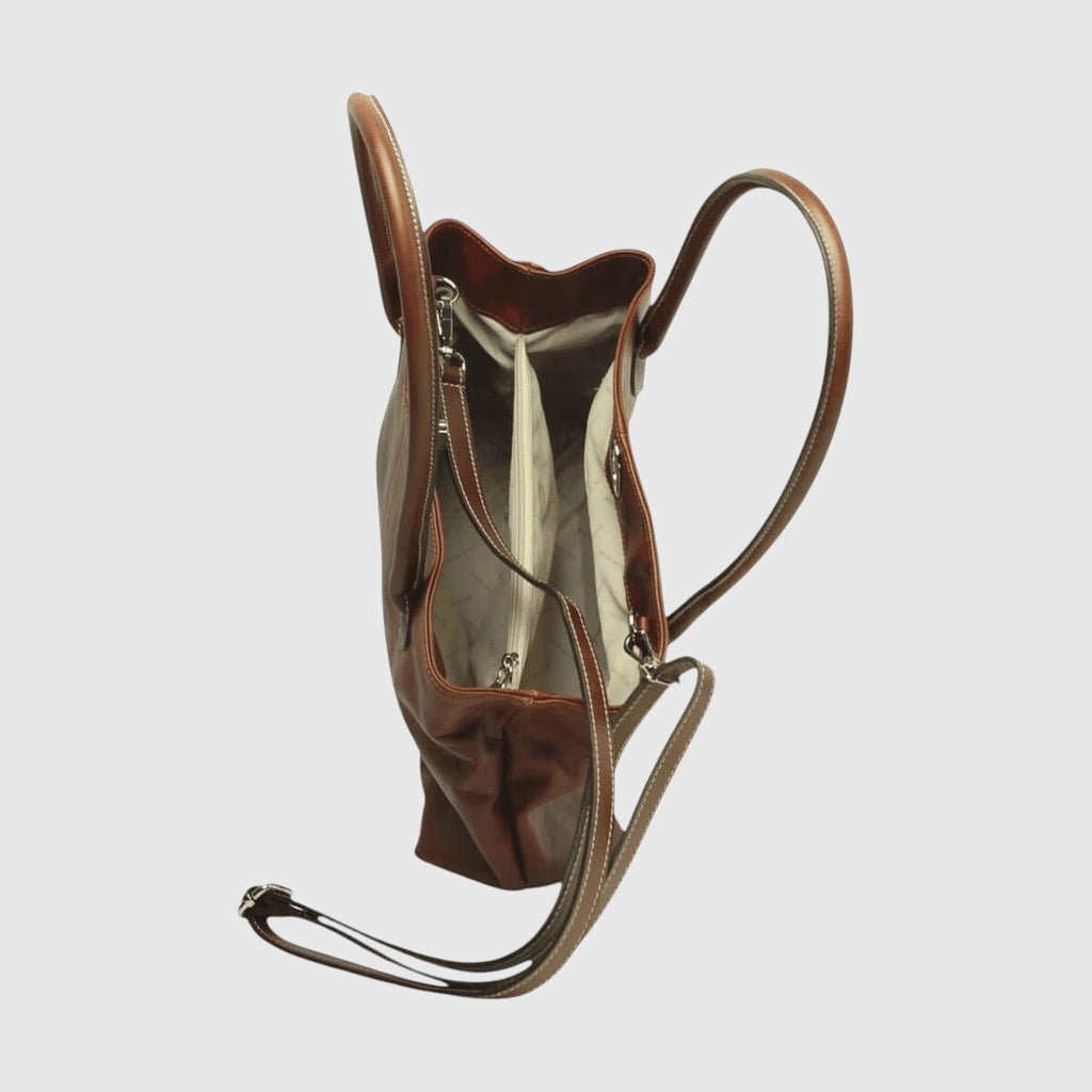 Borsa in pelle mogano con fodera chiara, apertura con zip e vista interna laterale