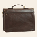 Borsa porta laptop in pelle marrone scuro con tasca frontale e zip, manici