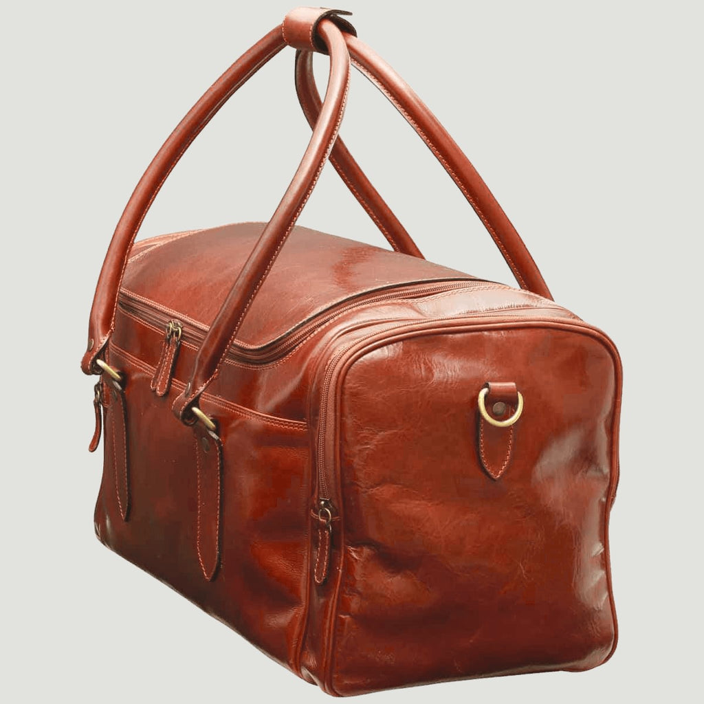 Borsa da viaggio in pelle cuoio con maniglie alte e tracolla laterale