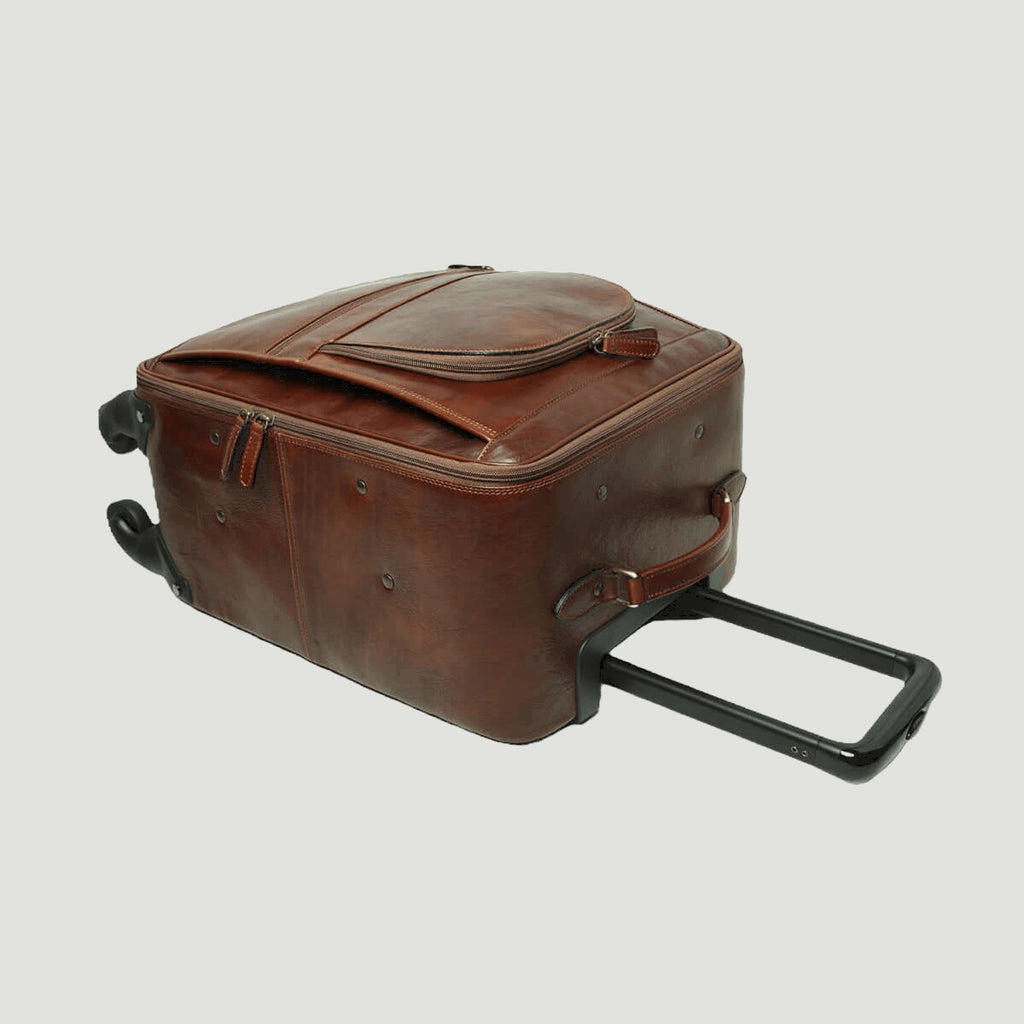 Trolley in pelle marrone con manico estensibile e chiusura laterale