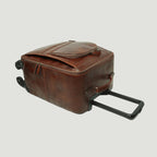 Trolley in pelle marrone con manico estensibile e chiusura laterale