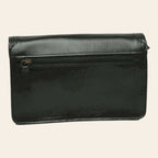 Pochette in pelle nera con tasca frontale e zip superiore, vista laterale