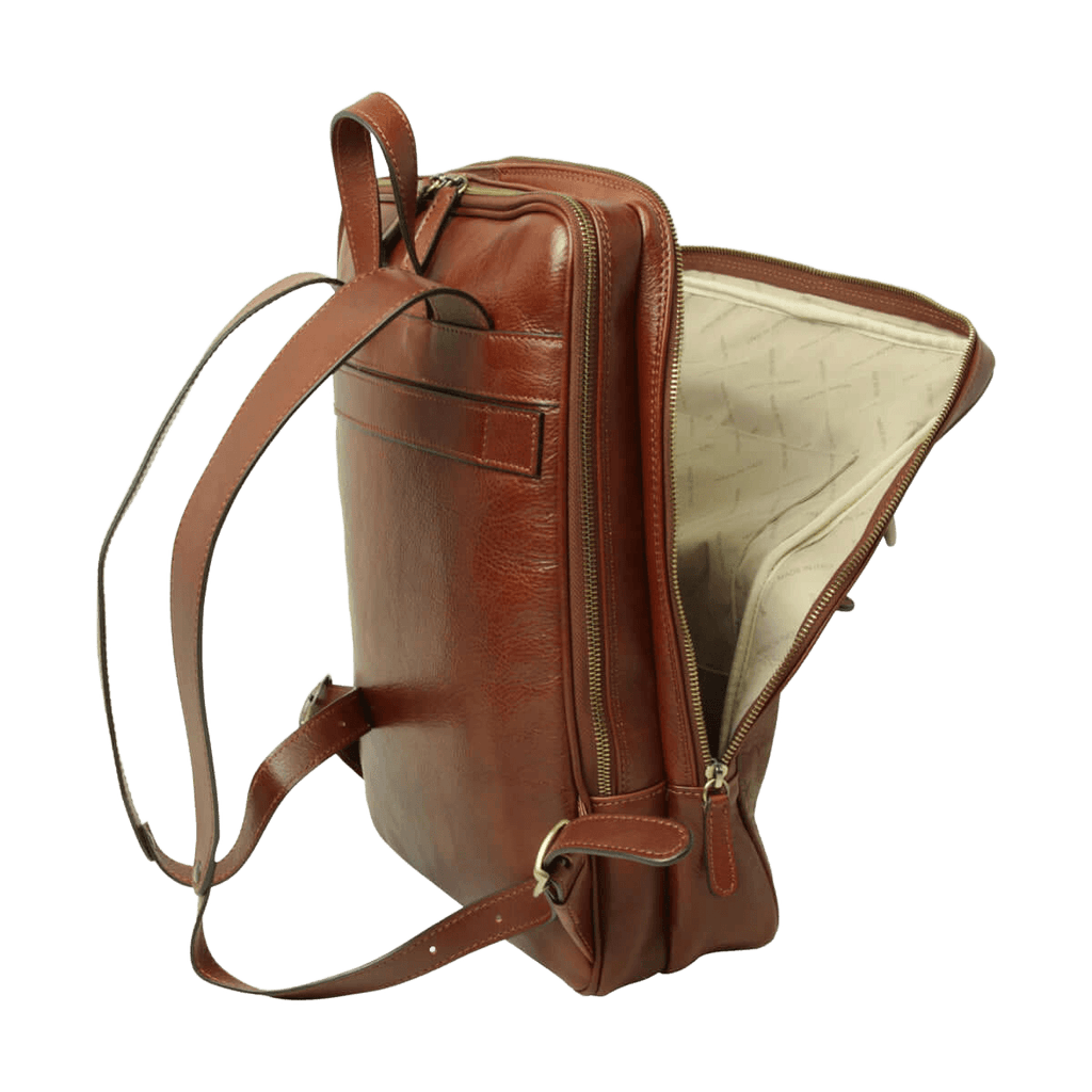 Brown full-grain calfskin backpack, side view with a zip pocket