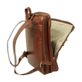 Brown full-grain calfskin backpack, side view with a zip pocket