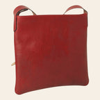 Borsa a tracolla rossa in pelle con manici superiori e bordi arrotondati