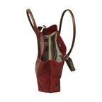 Borsa a spalla rossa bicolore con interno foderato beige visibile e zip laterale
