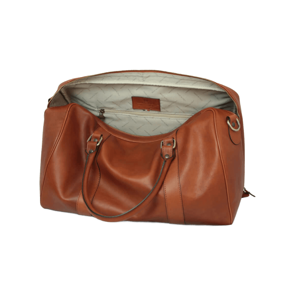 Borsa da viaggio in pelle pieno fiore cuoio, vista interna con fodera chiara e tasca.