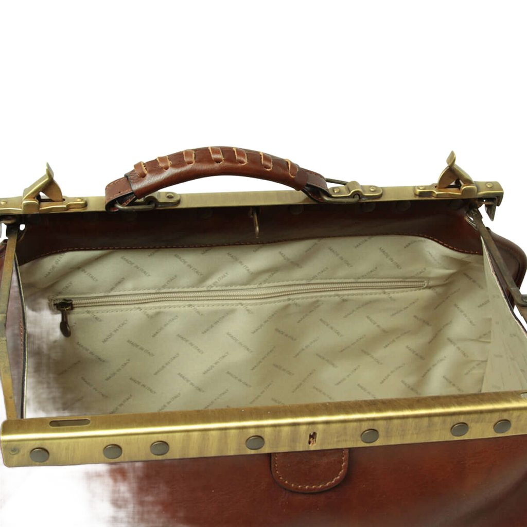 Borsa da viaggio media in pelle marrone, interno chiaro con fodera a disegni e zip