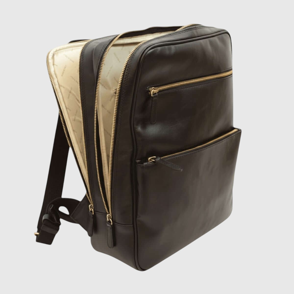 Zaino in pelle bicolore, pannello chiaro e scuro, chiusure con zip color oro