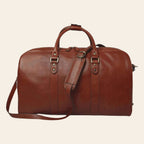 Borsa da viaggio in pelle artigianale color mogano, manici e tracolla con fibbie