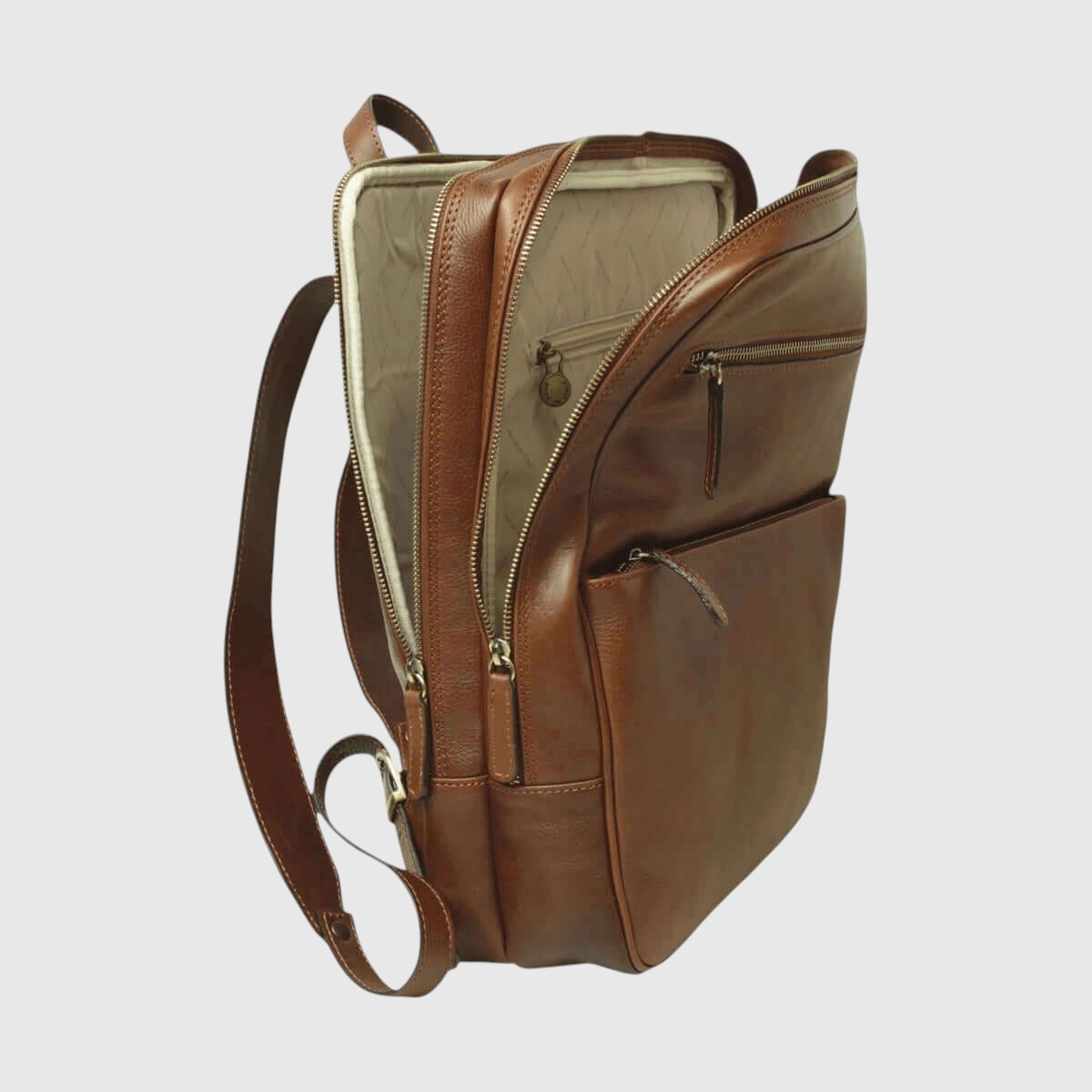 Zaino in pelle castagna con tasche con zip e interno beige visibile