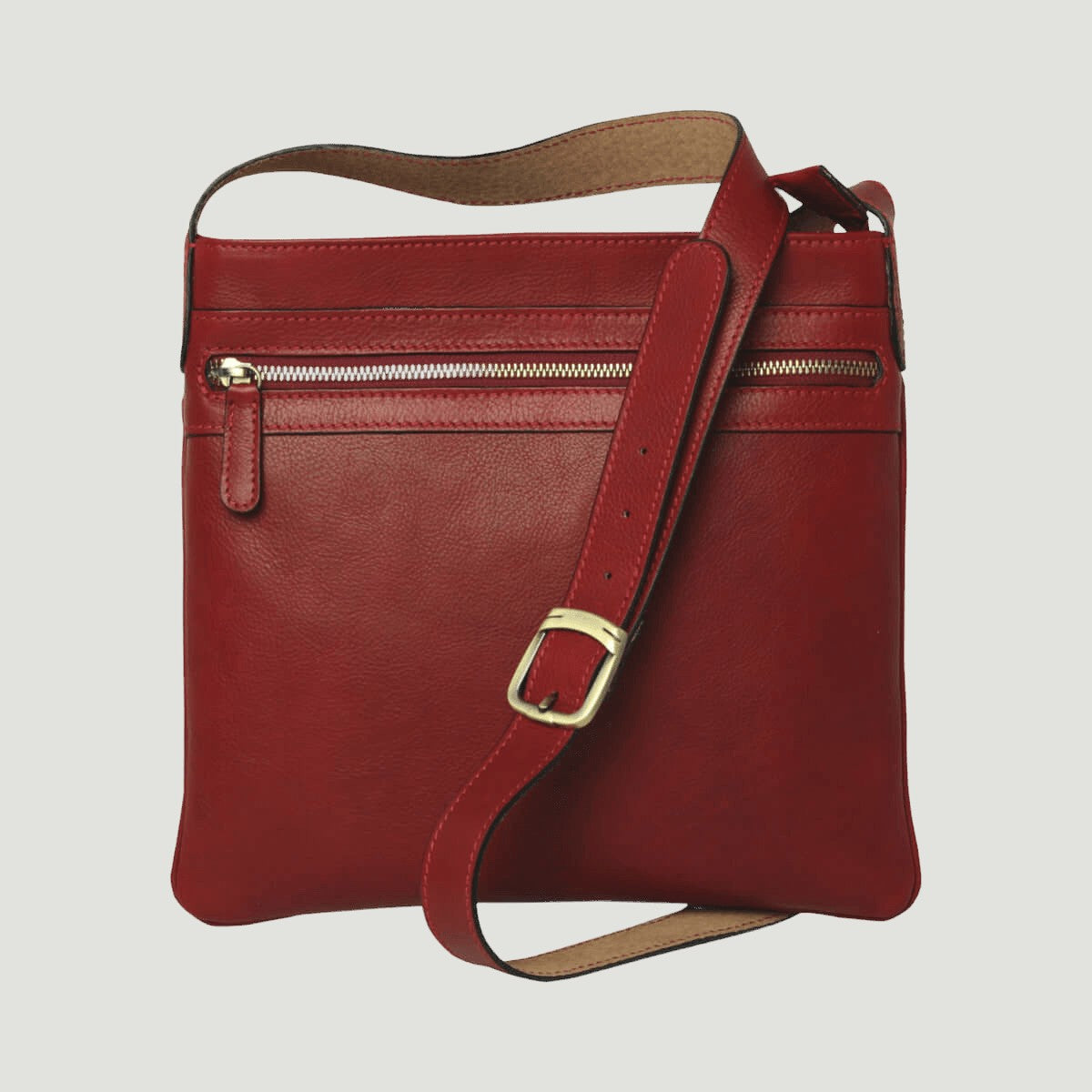 Borsa a tracolla in pelle rossa con tasca frontale e tracolla regolabile in cuoio