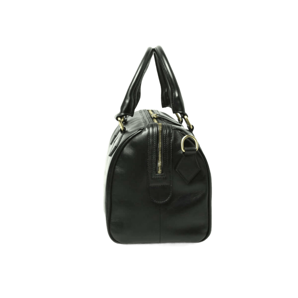 Borsa bauletto in pelle nera vista posteriore, manici e zip centrale.
