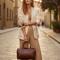 Bauletto in pelle marrone con due manici