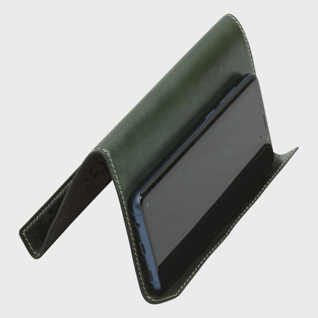 Supporto in pelle verde con vano interno nero e supporto a clip