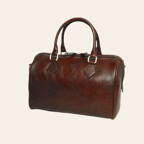 Bauletto in pelle marrone con due manici, tracolla laterale e fibbie