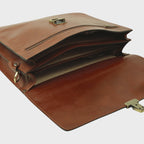 Cartella porta laptop in pelle marrone aperta con vano interno e tasca a zip