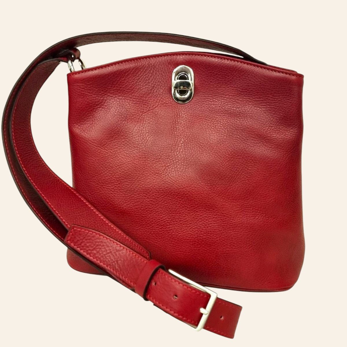 Borsa a secchiello Vetrina Fiorentina in pelle pieno fiore rossa con chiusura a girello e tracolla regolabile